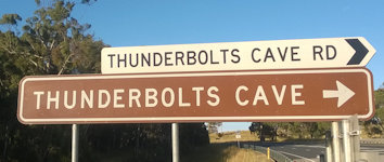 Brown sign for Thunderbolts Cave