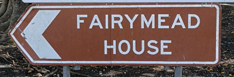 Brown sign for Fairymead House