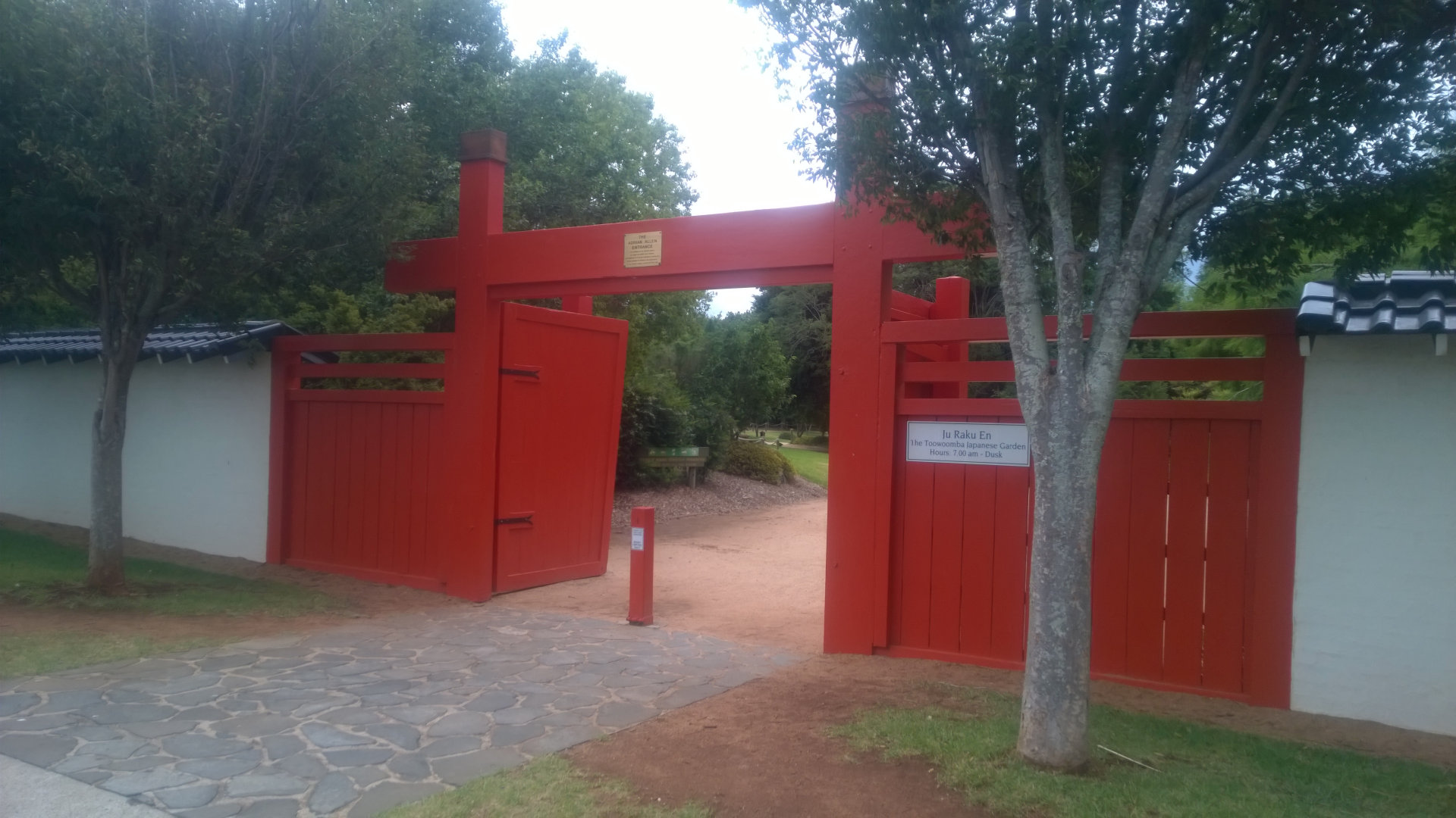 Red gates entry to the Japanese gardens in Toowoomba, named Ju Raku En, which means 'to enjoy peace and longevity in a public place'