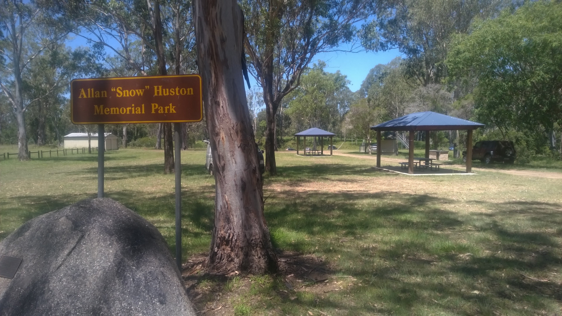 Allan "Snow" Huston Memorial Park, with picnic tables in the background. The park is between Murgon and Wondai along the Bunya Highway, a quiet rest stop away from the Bunya Highway