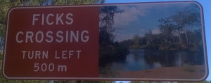 Brown sign for Ficks Crossing