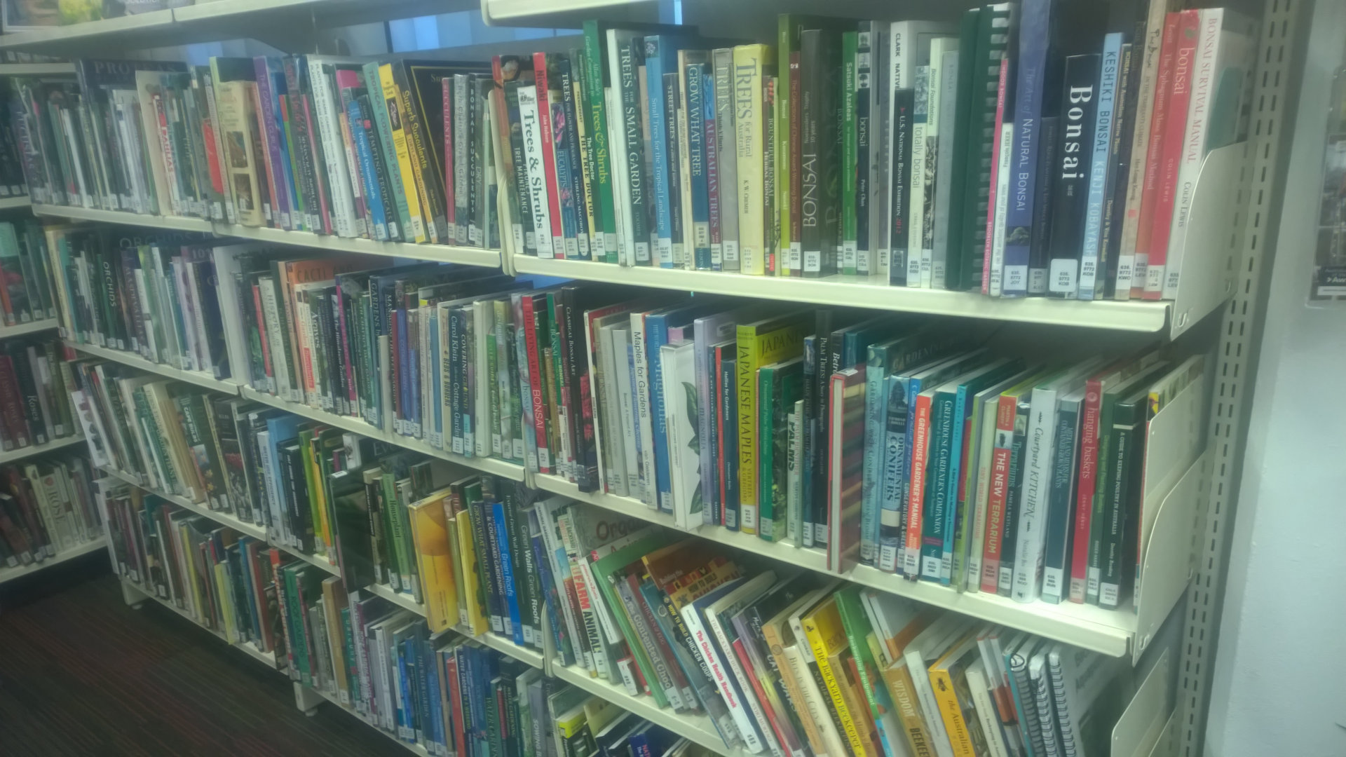 Book shelves in the Mt Coot-tha Library, located on the grounds of the Mt Coot-tha Botanic Gardens, specialising in botany, gardening, landscape design, botanic illustration, conservation, herbal medicine, astronomy