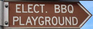 Brown sign for Elect. BBQ Playground