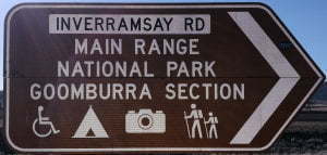 Main Range National Park Goomburra Section brown sign, symbols for disabled access, camping, scenic, hiking