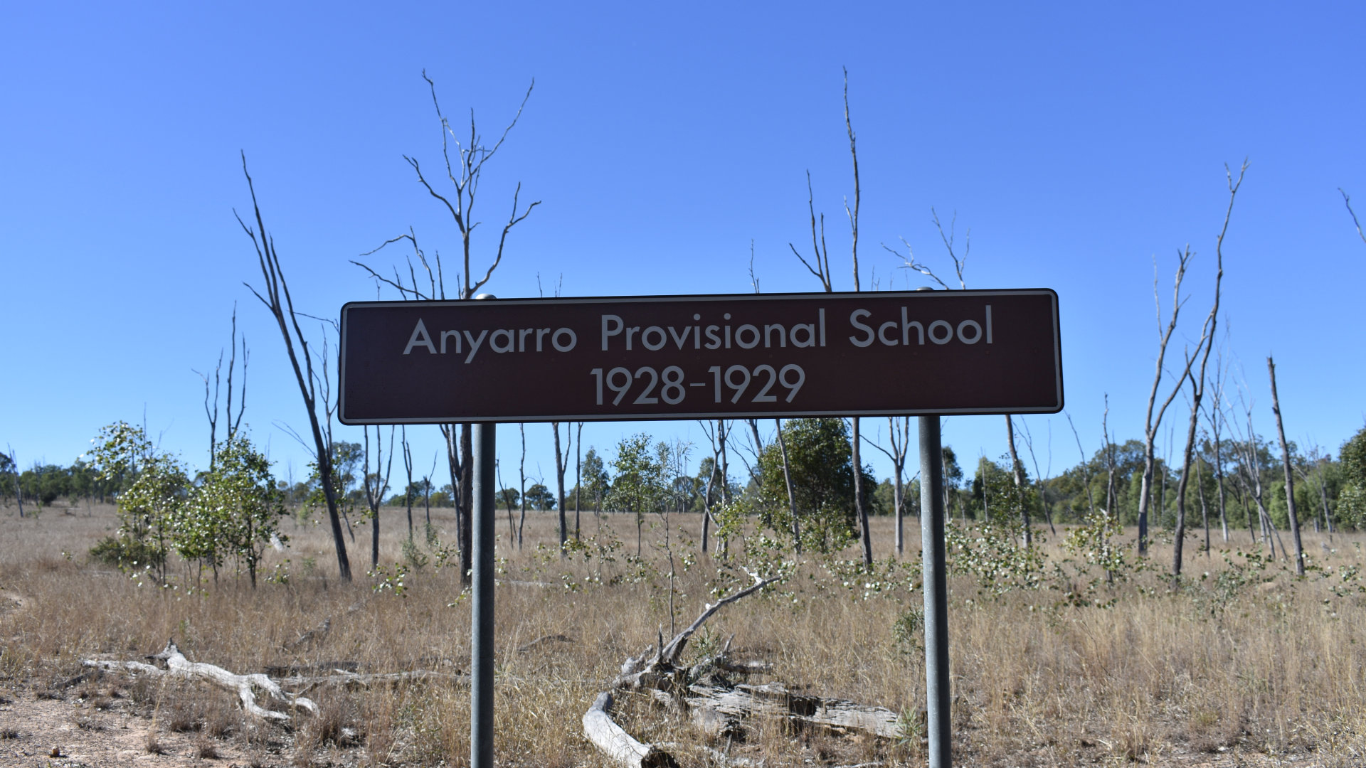 Brown sign for Anyarro Provisional School, 1928-1929, located south of Mulgildie near the old site of the Anyarro Railway Siding 