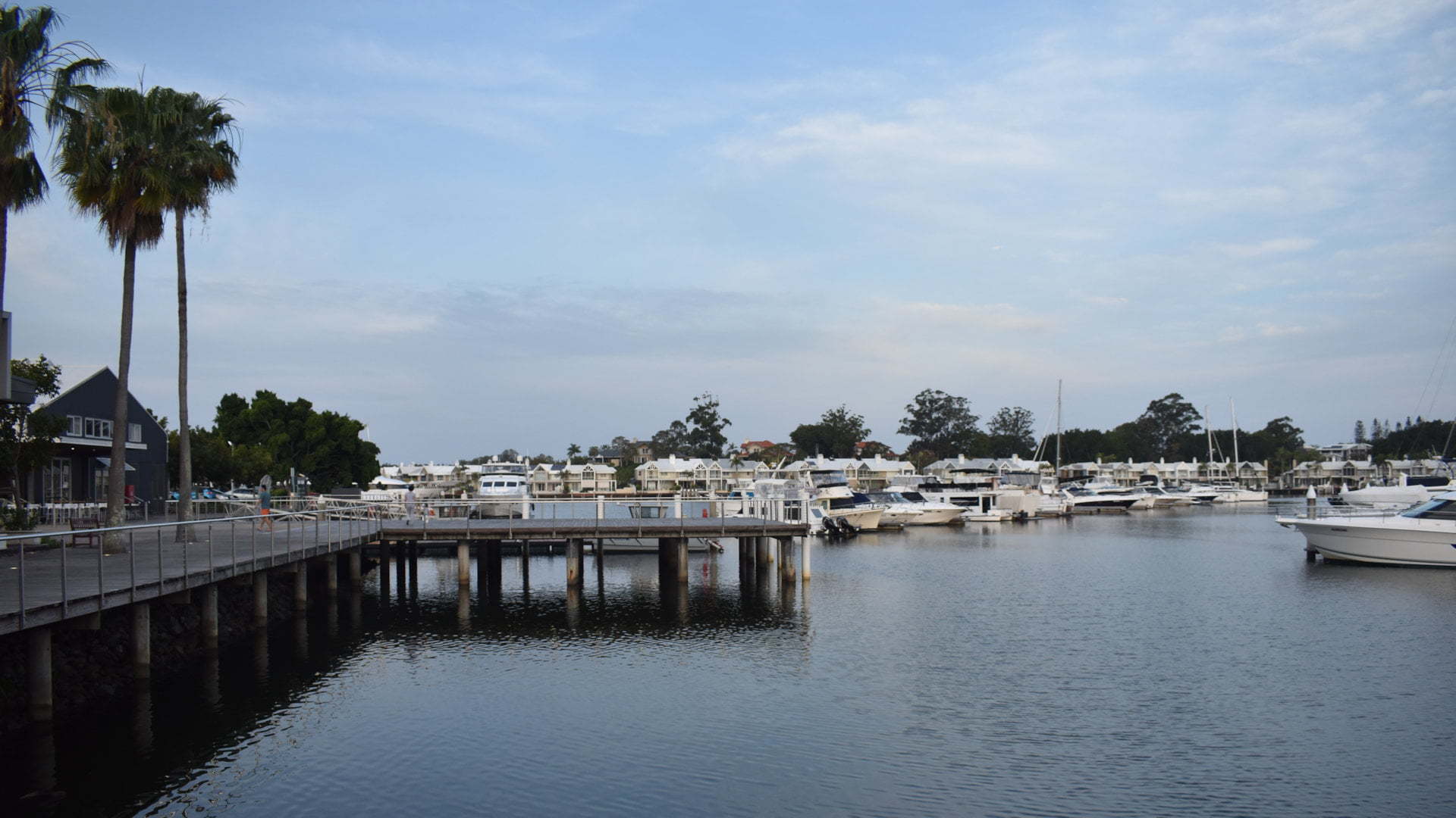 Marina, boardwalk wharf, and pier, at Sanctuary Cove