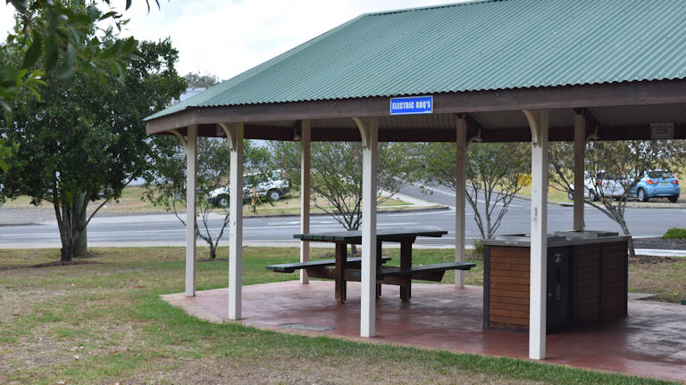 Electric BBQ and picnic table shelter at the back of Kyogle Visitor Information Centre