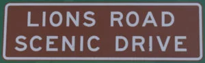 Brown sign for Lions Road Scenic Drive