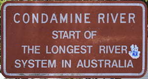 Brown Sign for Condamine River, start of the longest river system in Australia