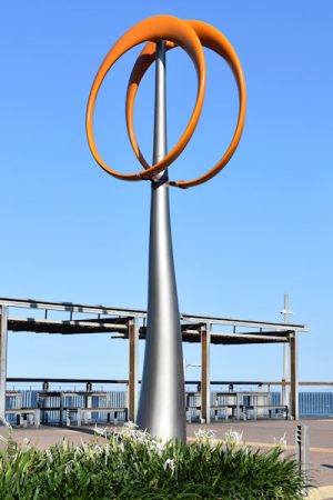OPTO kenetic orange rings in Redcliffe, just north of the jetty. The rings that spin and sway in the breeze are hypnotic to watch
