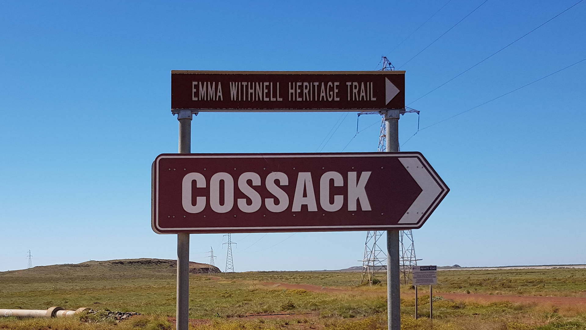Emma Withnell Historical Trail sign and Cossack sign