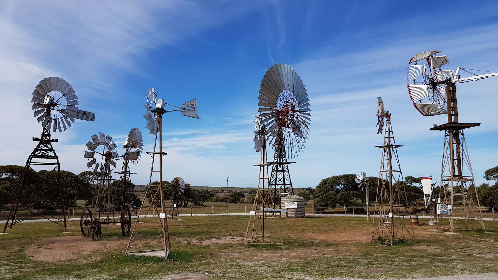 Collection of windmills at the Windmill Museum in Penong South Australia, including the Big Windmill, Australia's biggest windmill and one of the big things