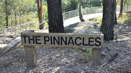 The Pinnacles sign, the ramp to the viewing platform in the background, taken at Pinnacle Rock in Maclean