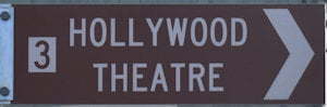 Brown sign for Hollywood Theatre