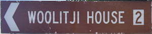 Brown sign for Woolitji House