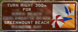 Brown sign for Greenmount Beach, turn right 300m for