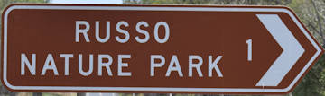 Brown sign for Russo Nature Park
