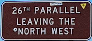 Brown sign for 26th Parallel, Leaving the North West