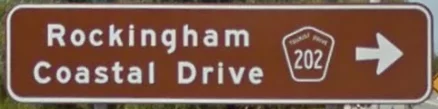Brown sign for Rockingham Coastal Drive, Tourist Route 202, Western Australia