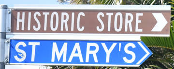 Brown sign for Historic Store, blue sign for St Mary's