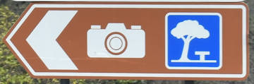 Brown sign for a lookout and rest stop