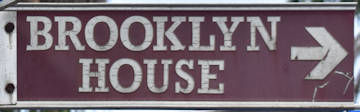 Brown sign for Brooklyn House