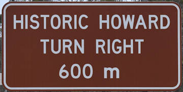 Brown sign for Historic Howard, turn right 600m