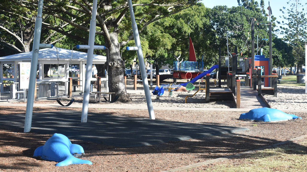 Playground with swings and climbing structures