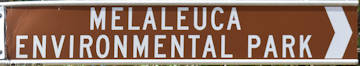 Brown sign for Melaleuca Environmental Park