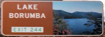 Brown sign for Lake Borumba, Exit 244