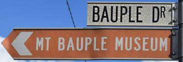 Brown sign for Mt Bauple Museum, white sign for Bauple Dr