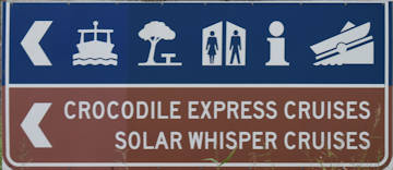 Brown sign for Crocodile Express Cruises and Solar Whisper Cruises