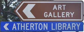 Brown sign for Art Gallery, blue sign for Atherton Library