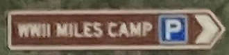 Brown sign for WWII Miles Camp